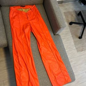 Orange leather pants